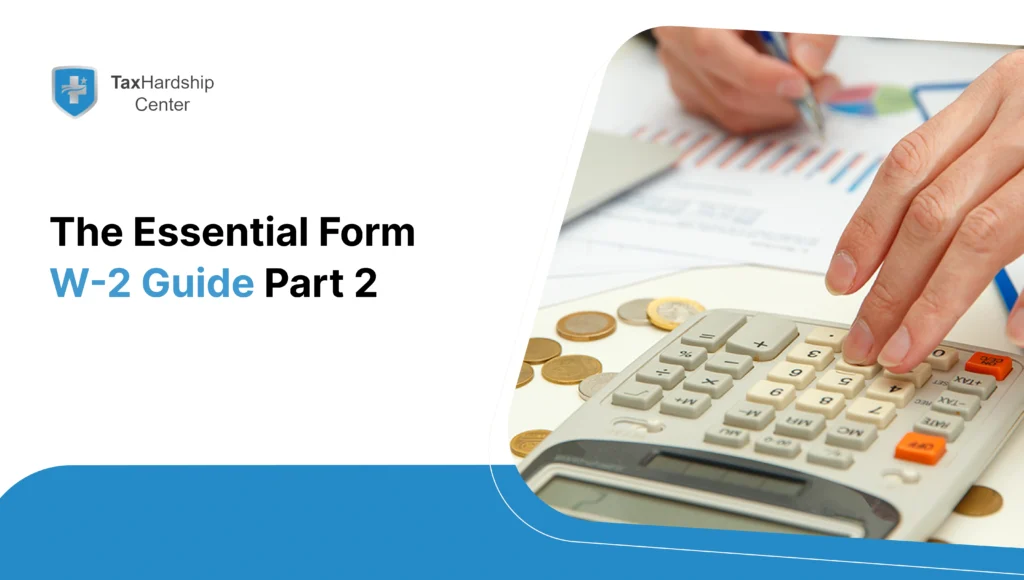 Person using a calculator with financial documents and coins while reviewing Form W-2 tax information.